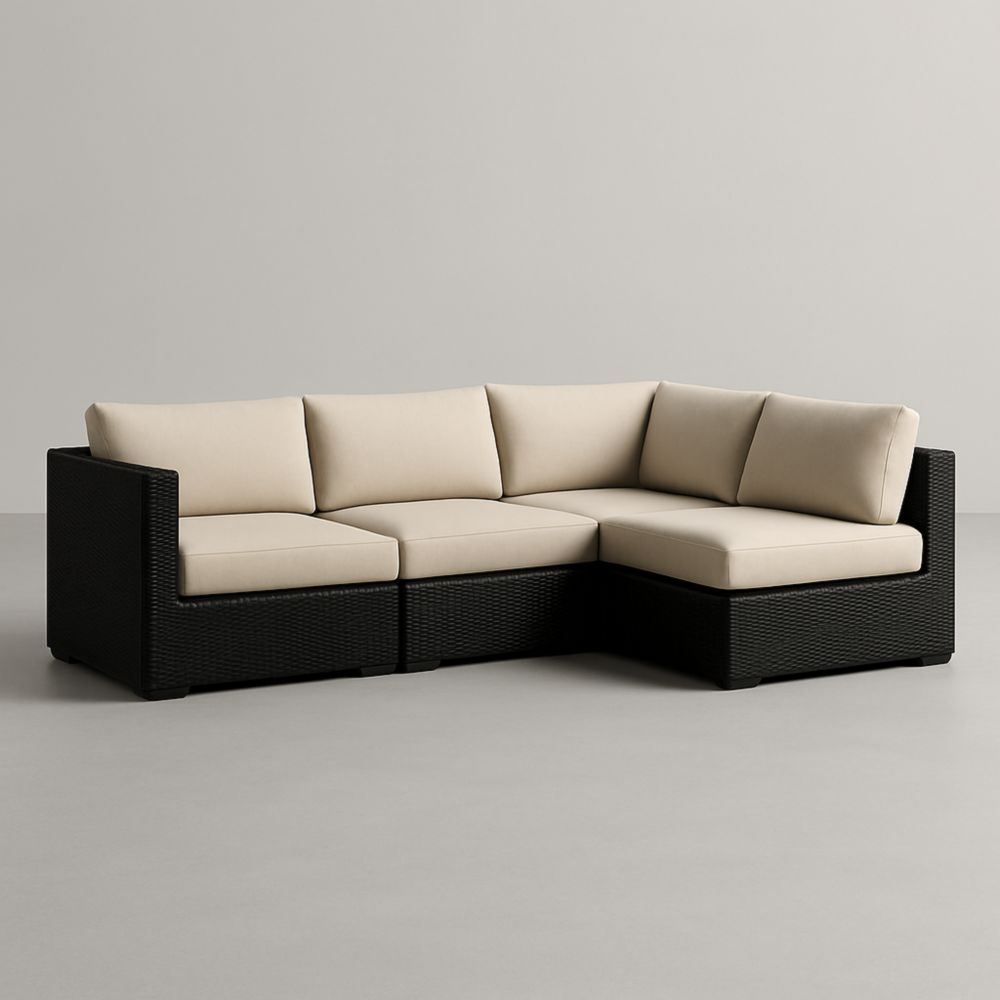 Canapé d'angle modulaire en résine tressée noire avec coussins beige