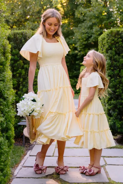 This lightweight, flowy, butter-colored dress is an effortless addition to any closet. 