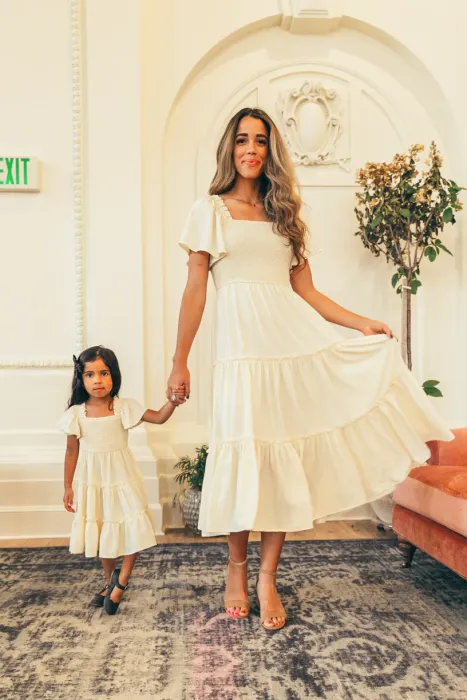 This lightweight, flowy, butter-colored dress is an effortless addition to any closet. 