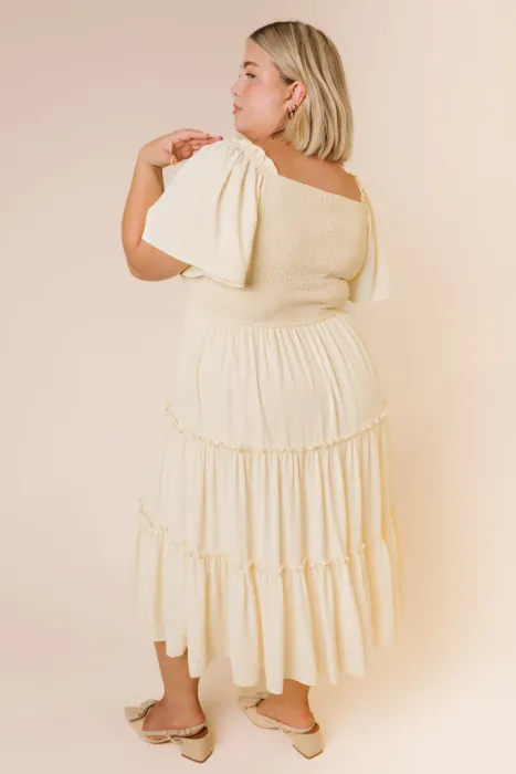 This lightweight, flowy, butter-colored dress is an effortless addition to any closet. 