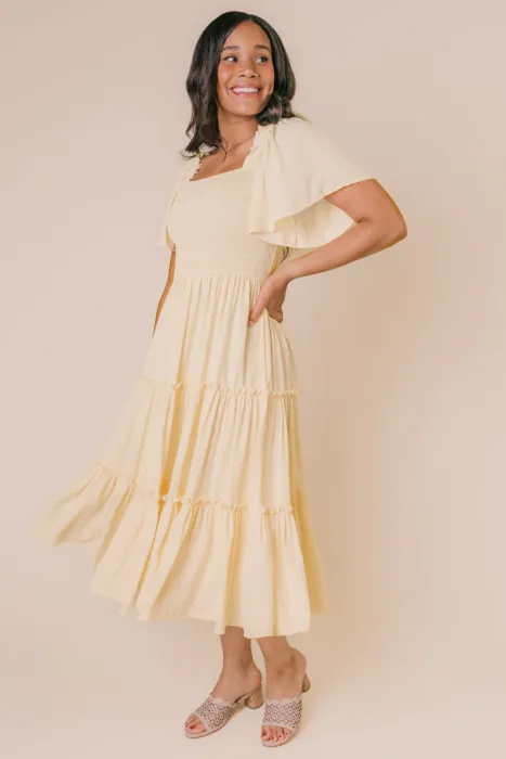 This lightweight, flowy, butter-colored dress is an effortless addition to any closet. 