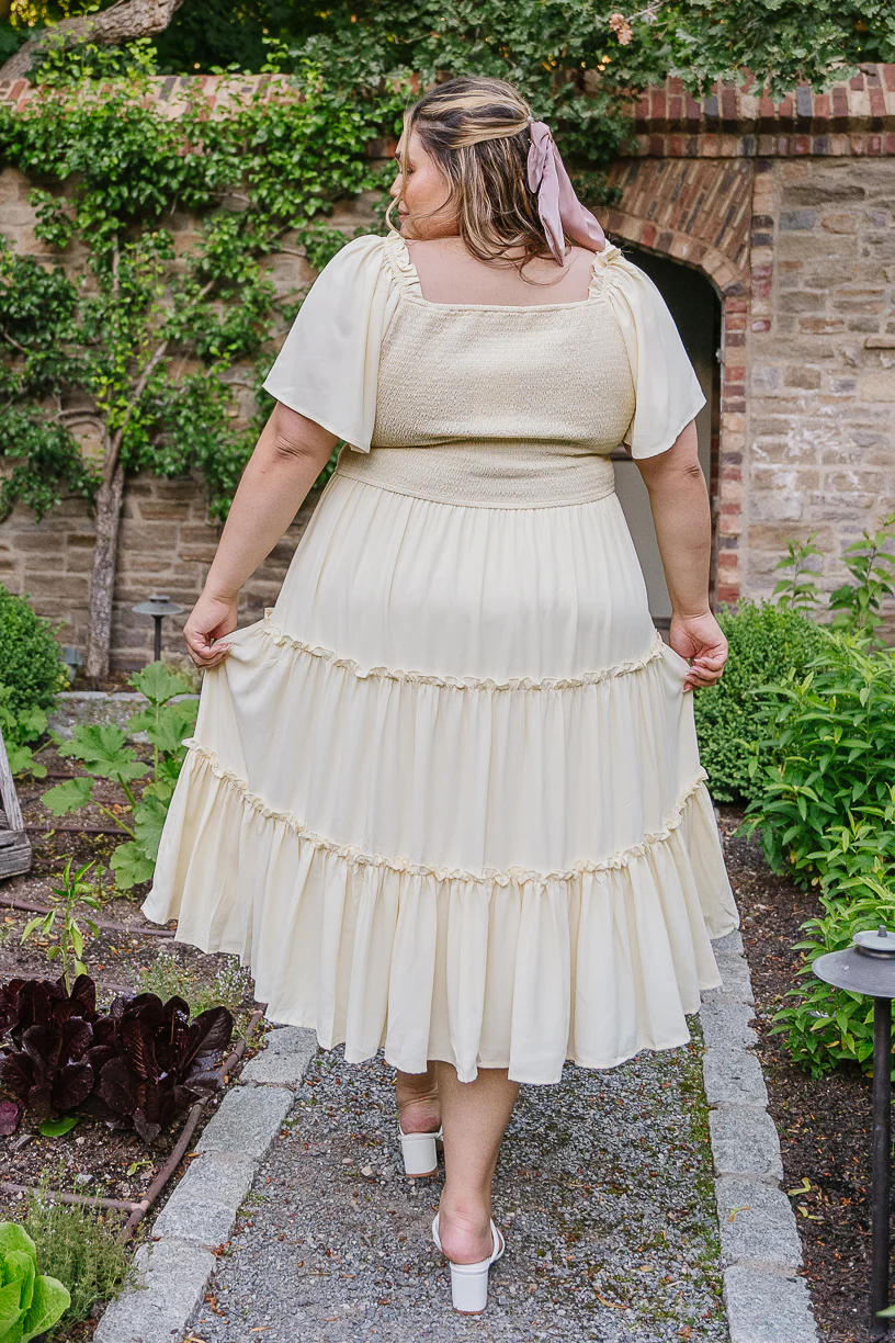 This lightweight, flowy, butter-colored dress is an effortless addition to any closet. 