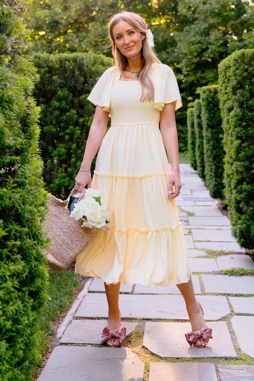 This lightweight, flowy, butter-colored dress is an effortless addition to any closet. 