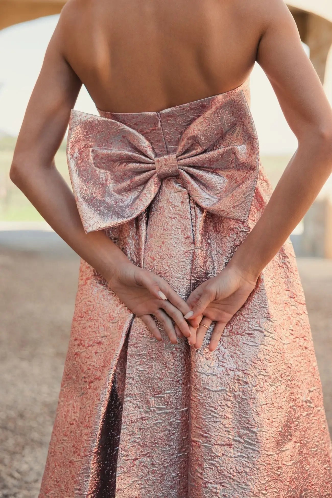 Pink Metallic Strapless Brocade Gown With Oversized Bow-Myartka