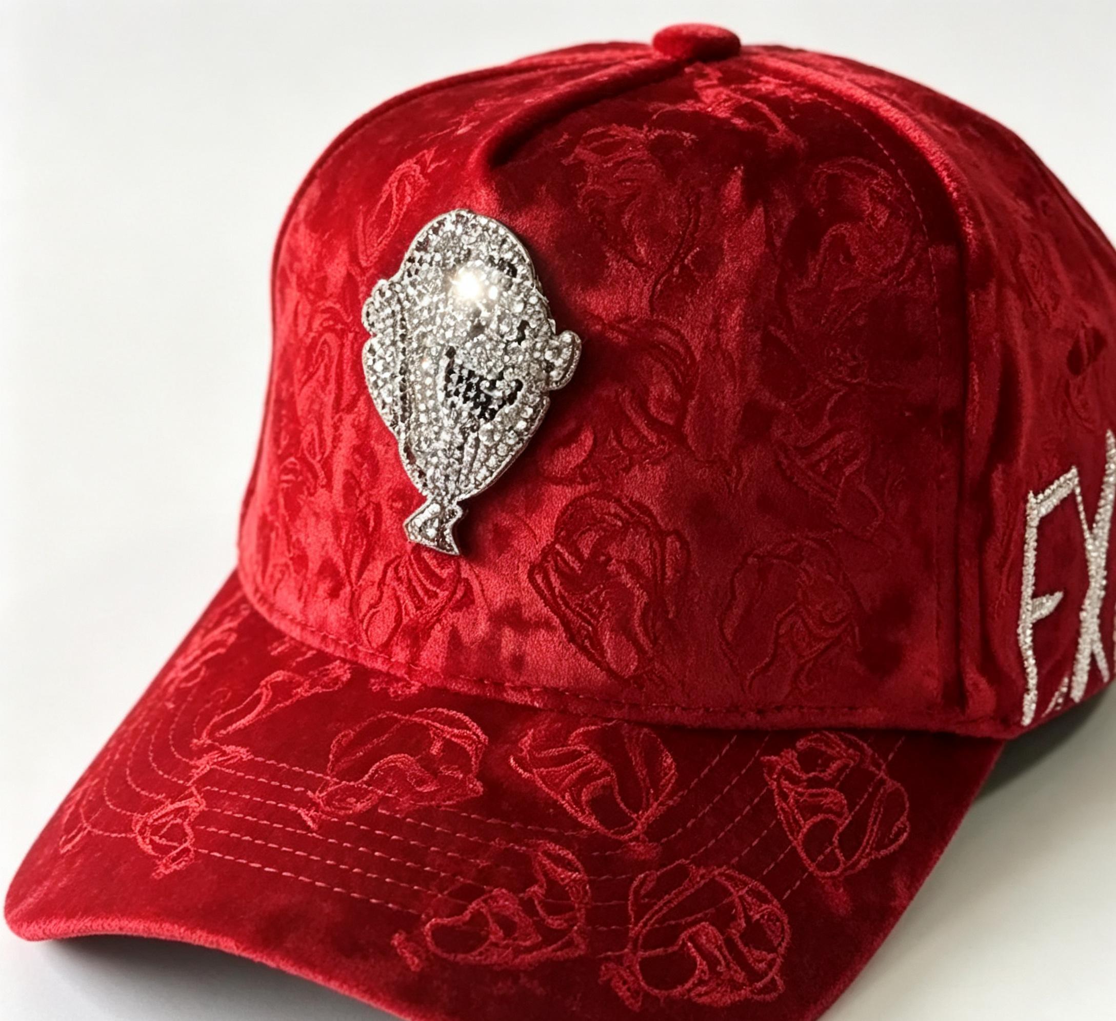 Detailed views of Ei Boo red velvet baseball cap showing rhinestone ghost emblem, side sparkling lettering, and embossed velvet texture