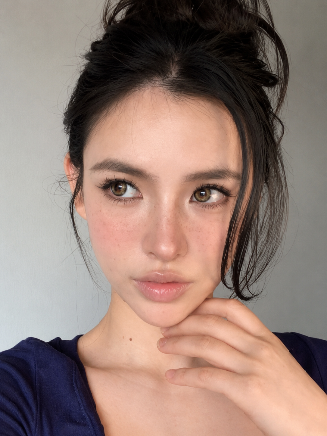 Model wearing Godestar Halo Honey Brown colored contact lenses with soft natural makeup