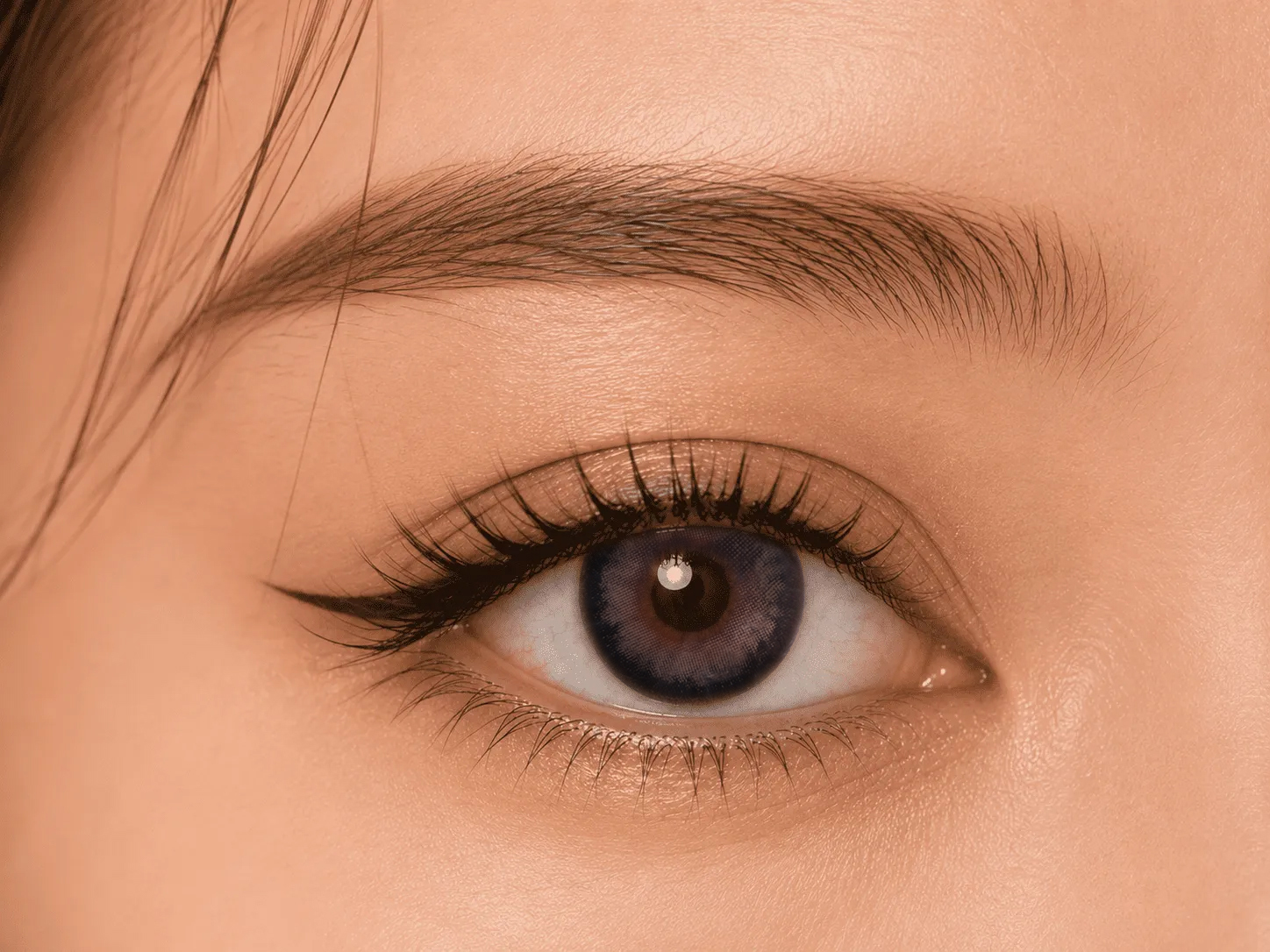 Dark brown eyes after wearing Toffee Brown colored contacts