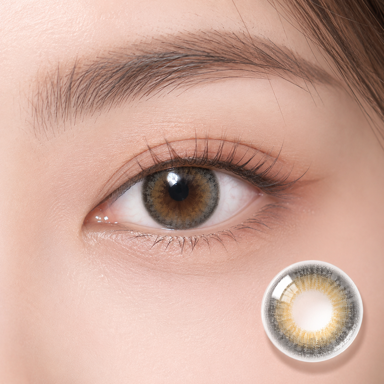 Godestar Smoky Quartz Halo gray gold colored contacts on eye with lens detail
