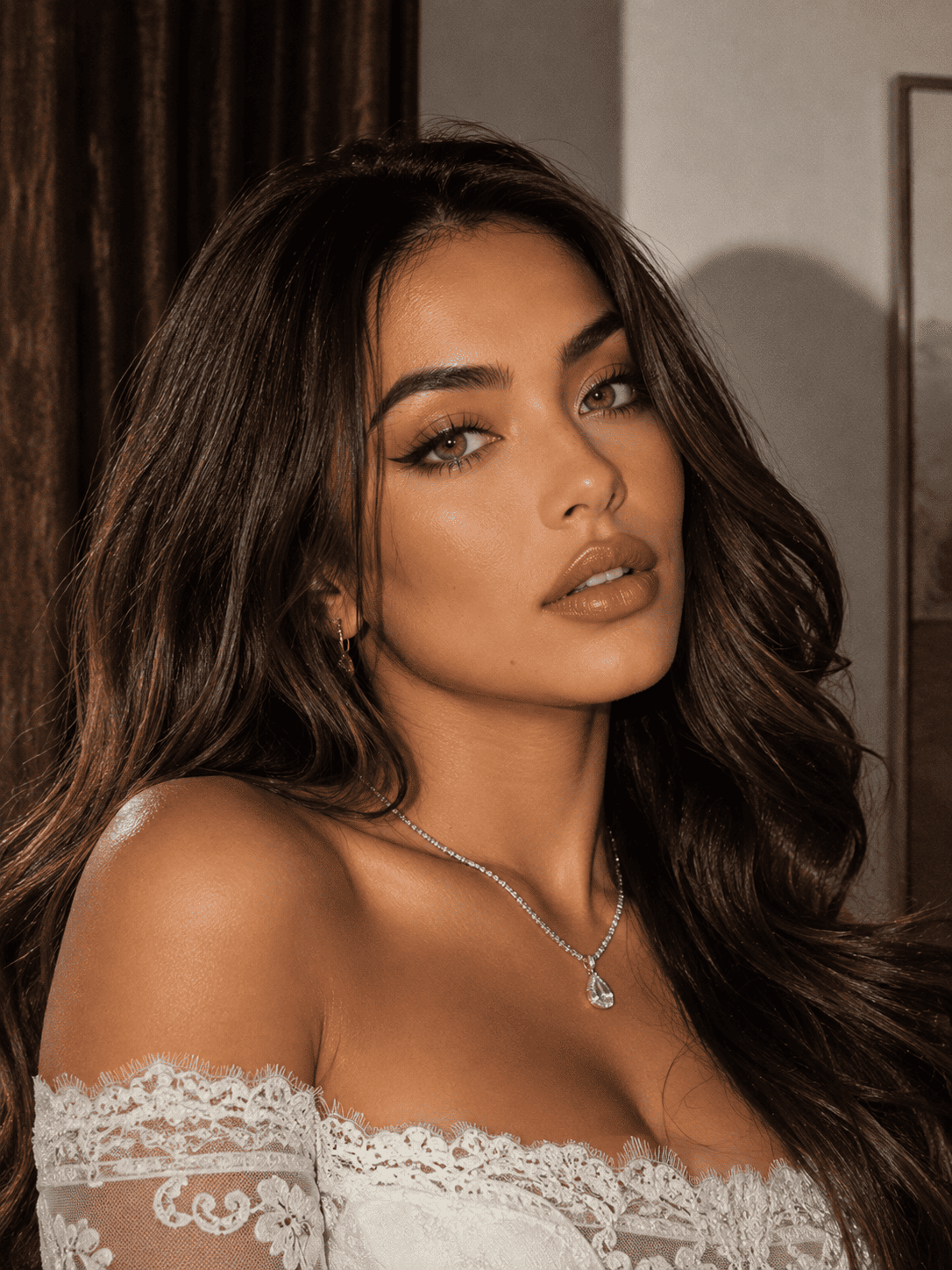 Model wearing GODESTAR Butterscotch Ray honey amber colored contacts in a golden hour makeup look