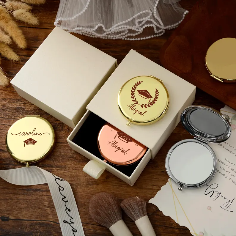 A personalized graduation gift mirror with engraved lettering, perfect for the 2026 graduating class. A customized college gift for your daughter, a meaningful graduation keepsake.