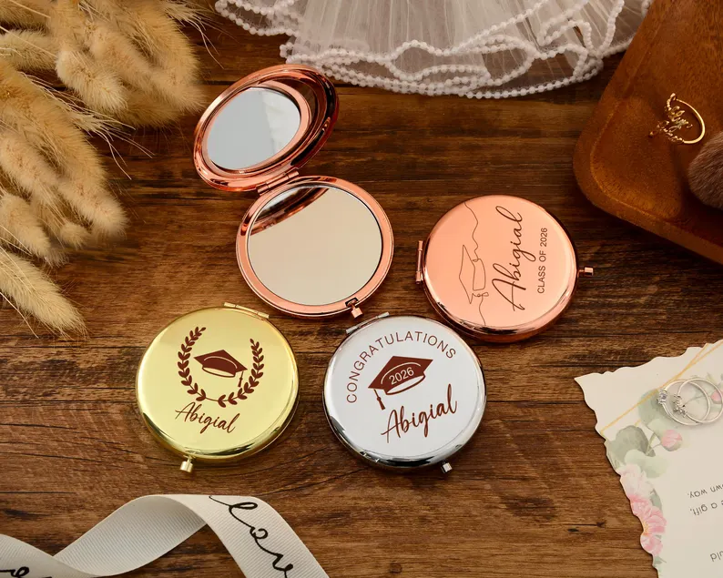 A personalized graduation gift mirror with engraved lettering, perfect for the 2026 graduating class. A customized college gift for your daughter, a meaningful graduation keepsake.