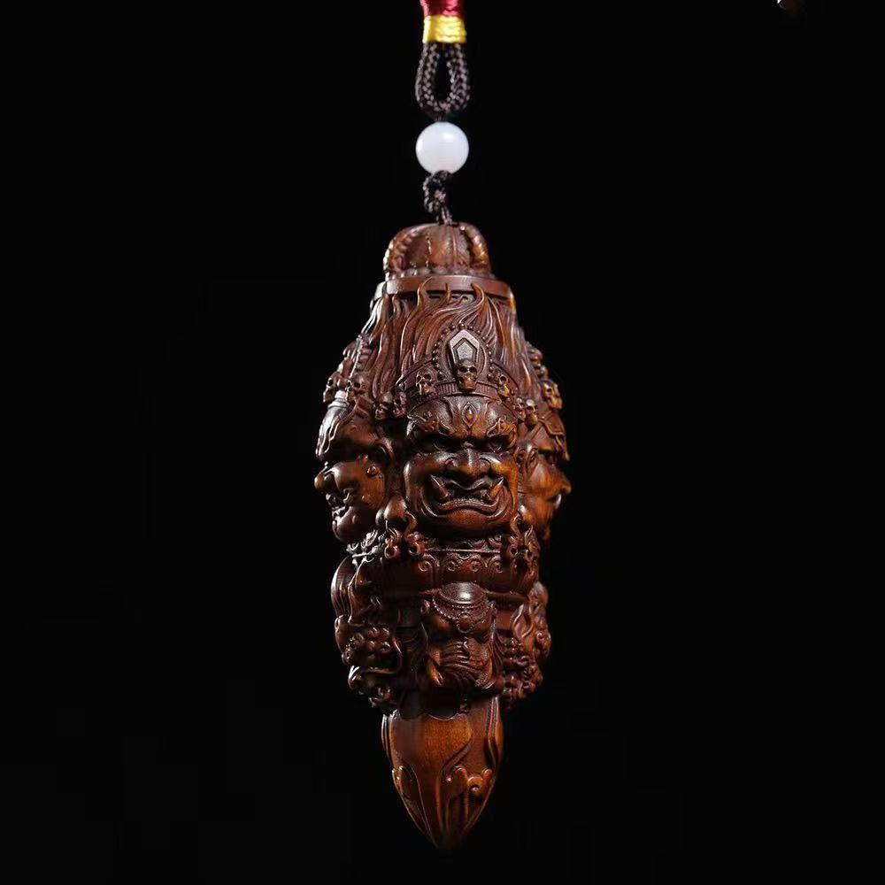 Three-Faced Mahakala Vajra Wood Pendant