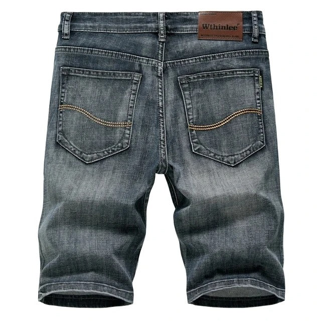 Product image showing versatile denim shorts