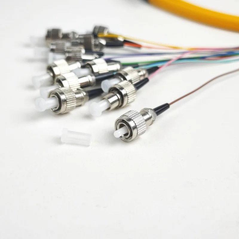 High Quality ST/UPC-12 CORE Pigtail Fiber Optic Patch Cord Cable Qingdao APT FTTH Factory 