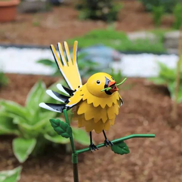 Goldfinch, Cardinal, Western Bluebird, Ruby-throated Hummingbird on a garden stake