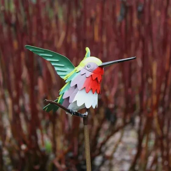 Goldfinch, Cardinal, Western Bluebird, Ruby-throated Hummingbird on a garden stake