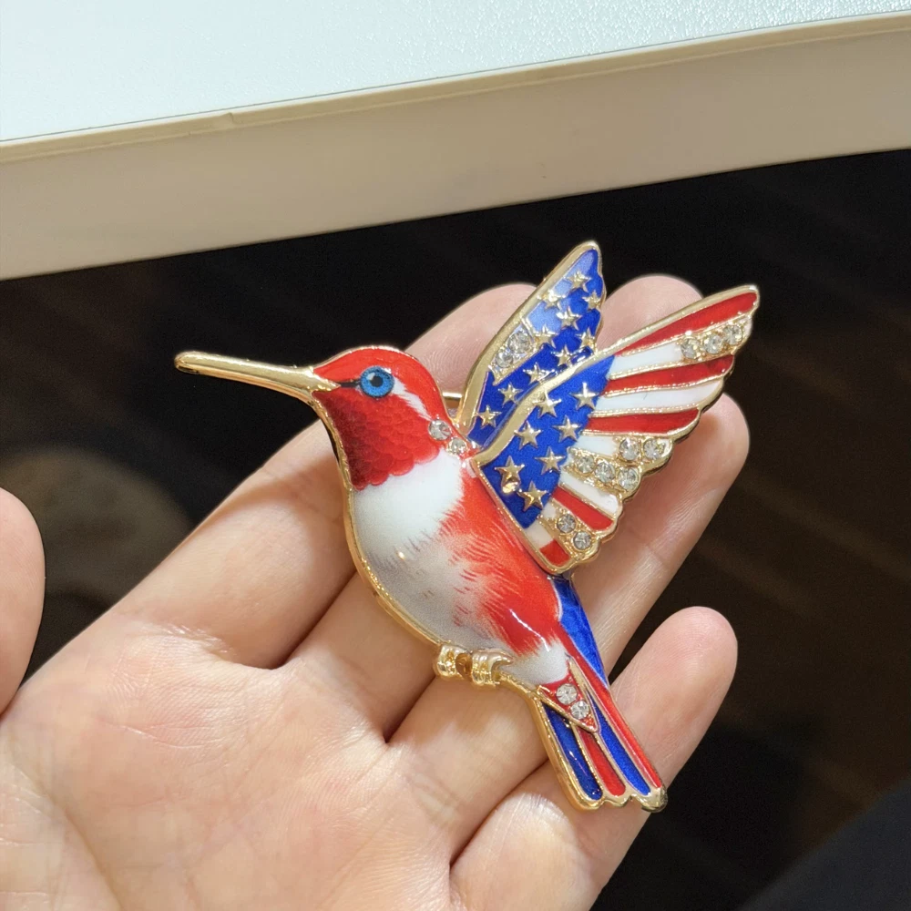  Patriotic Red, White & Blue Hummingbird Brooch — 𝟮𝟱𝟬𝘁𝗵 𝗔𝗻𝗻𝗶𝘃𝗲𝗿𝘀𝗮𝗿𝘆. 𝗙𝗼𝗿 𝘁𝗵𝗲 𝗢𝗻𝗲𝘀 𝗪𝗵𝗼 𝗙𝗹𝗲𝘄 𝗧𝗼𝗼 𝗙𝗮𝗿.