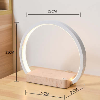 Table lamp with dimensions labeled on a wooden surface