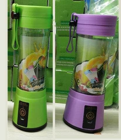 Two portable blenders, one green and one purple, with a colorful design on a white surface.