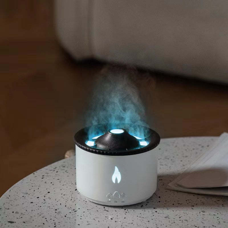 White and black humidifier emitting steam on a speckled surface with a blurred background