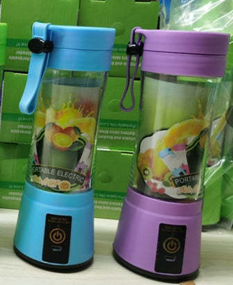 Blue and purple portable blenders with visible branding on a white surface.