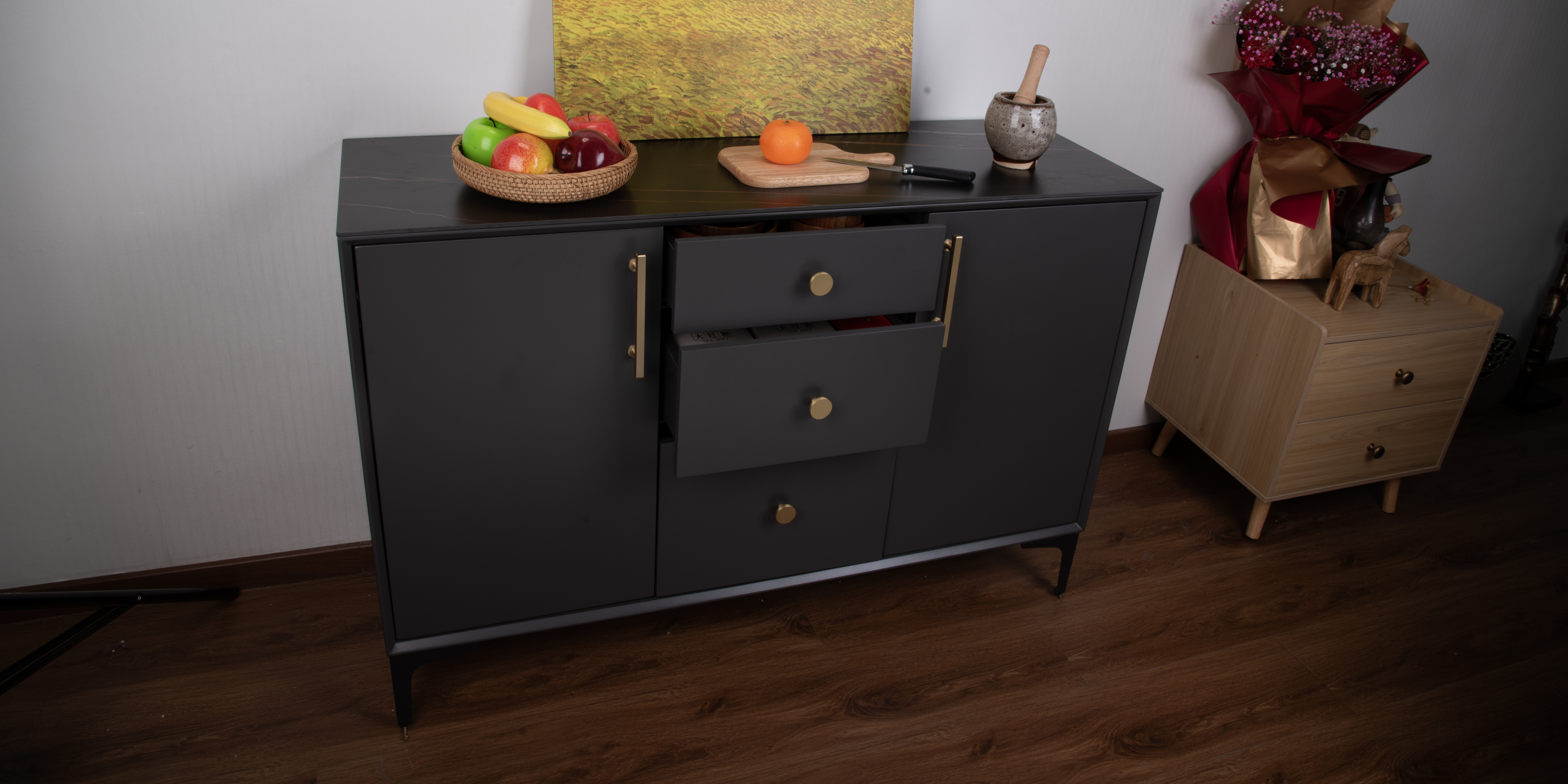 QOGRISUN brass single hole pulls and two hole cabinet pulls on minimalist cabinets.