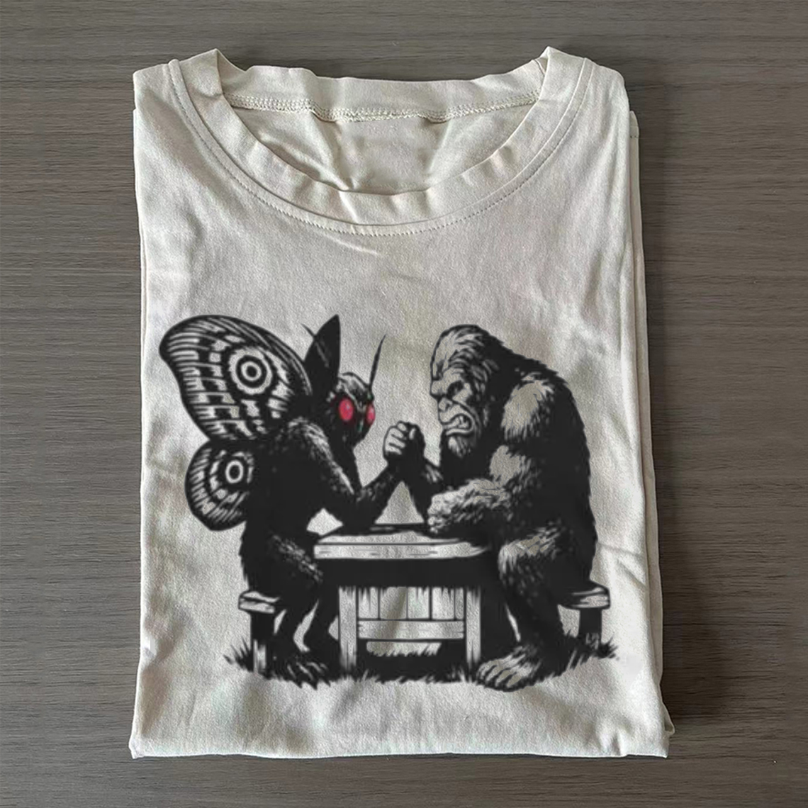 Bigfoot v Mothman T-shirt-ShawnCraft