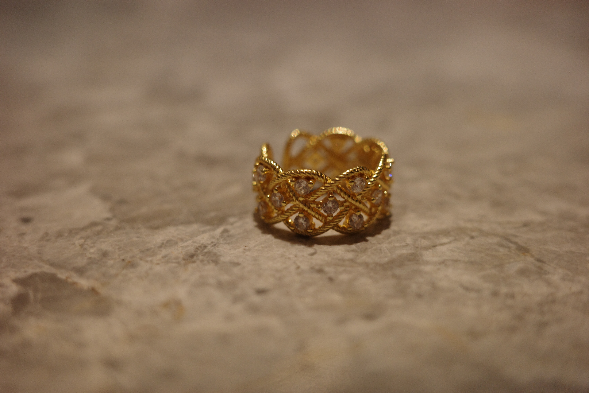 We don't just engineer shape; we weave light. The distinctive hollow-out patterns represent the "sacred geometry" of celestial structures, transformed into a wearable "Second Skin" of gold and diamonds. The openwork ensures the ring remains lightweight an