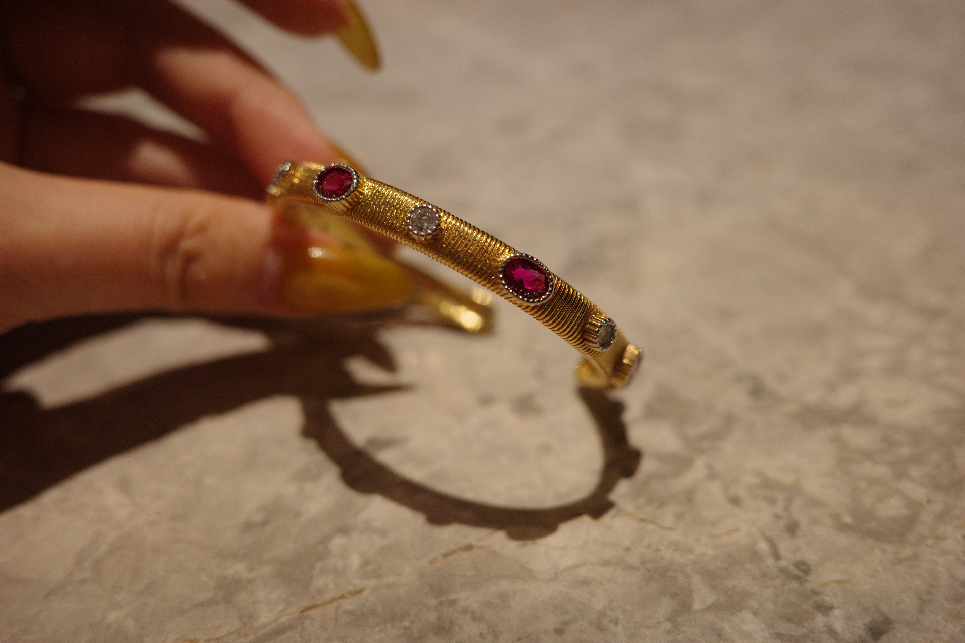 The Saturn Sovereign Cuff – Gilded Silk Engraving & Crimson Corundum Centerpiece