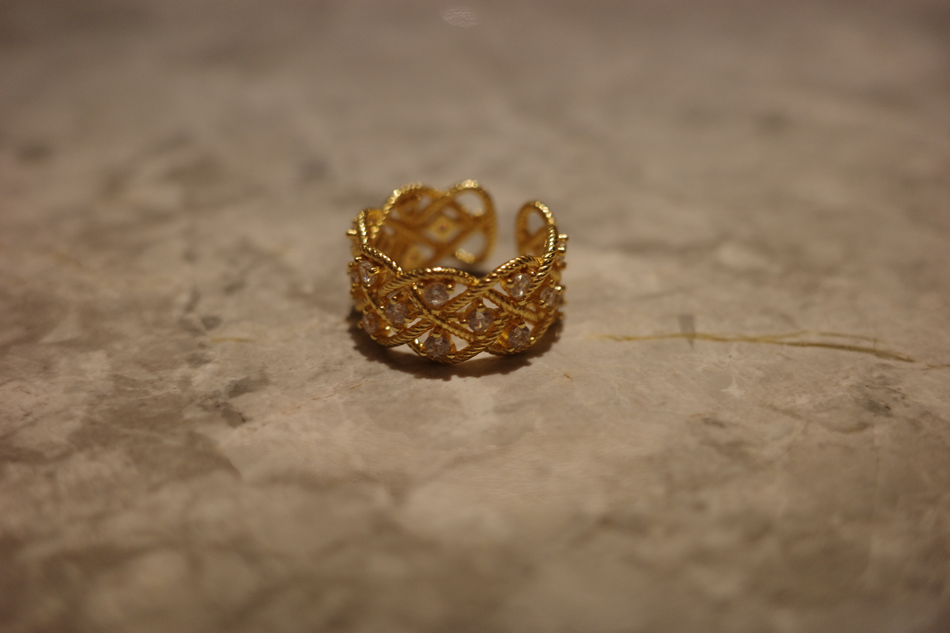 We don't just engineer shape; we weave light. The distinctive hollow-out patterns represent the "sacred geometry" of celestial structures, transformed into a wearable "Second Skin" of gold and diamonds. The openwork ensures the ring remains lightweight an