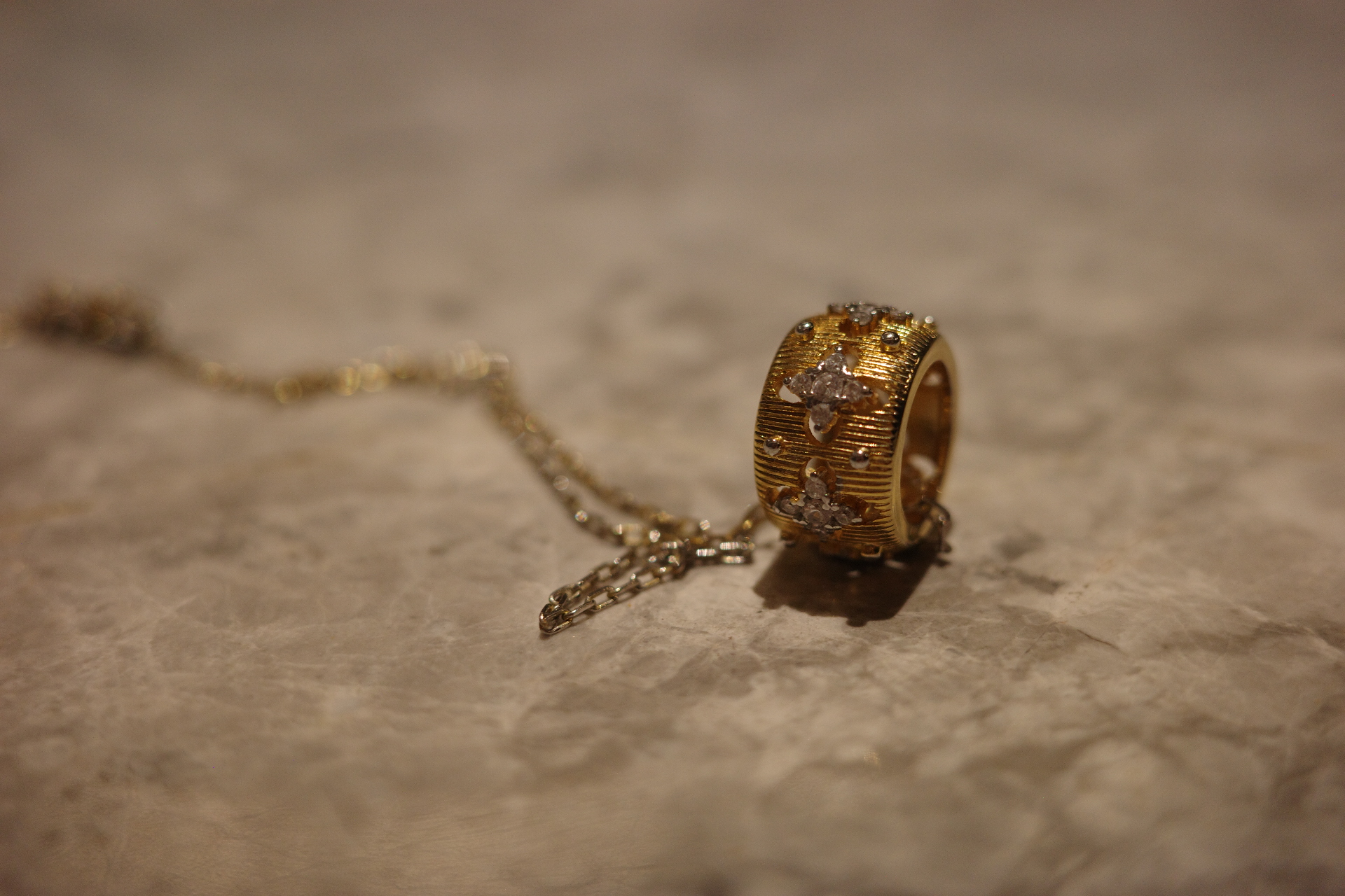 The Saturn Clover Pendant – Brushed Gold Filigree & Radial Diamond Pavé