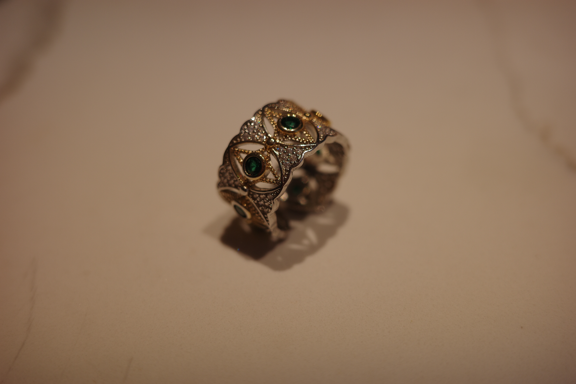 The Jupiter Venetian Eye Ring – Two-Tone Celestial Lattice & Verdant Zirconia