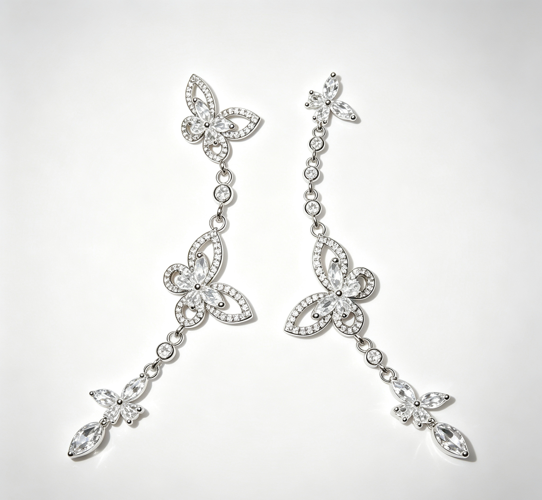 The Mercury Butterfly Earrings – Geometric Brilliance in Motion