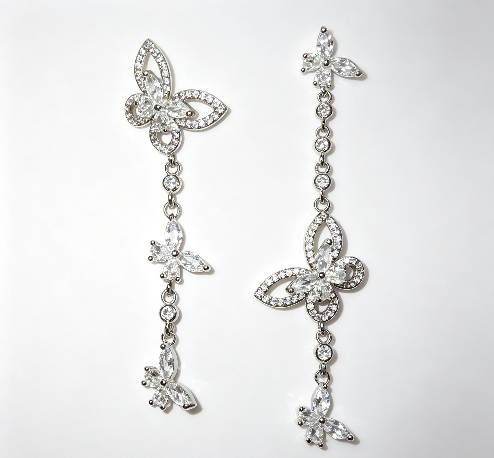 The Mercury Butterfly Earrings – Geometric Brilliance in Motion