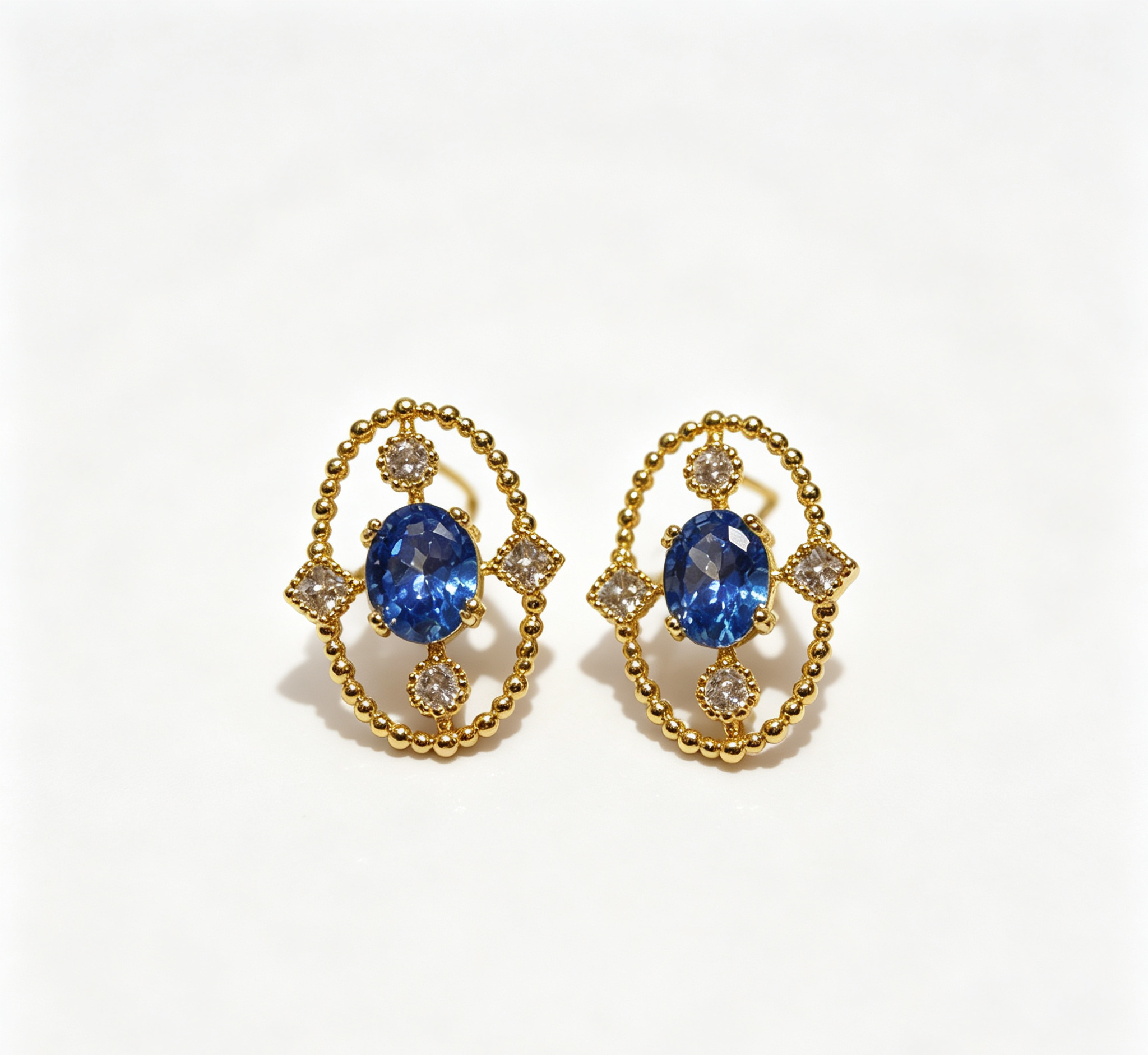 The Venus Azure Crown Earring – Intricate Gold Lace & Oval Zirconia