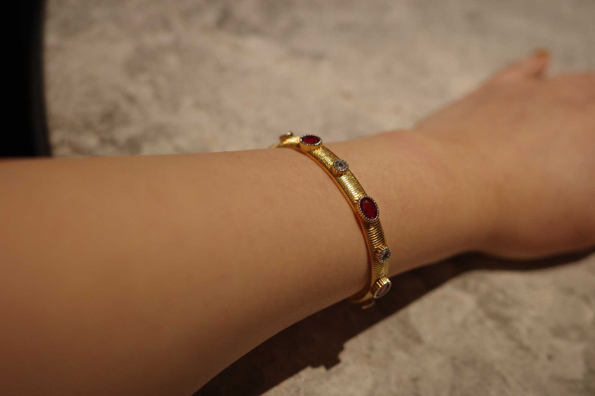 The Saturn Sovereign Cuff – Gilded Silk Engraving & Crimson Corundum Centerpiece