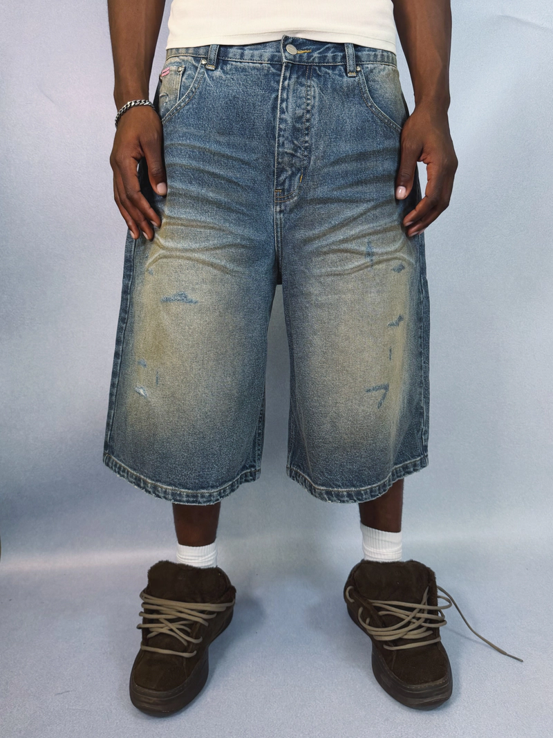 DISTRESSED DENIM SHORTS