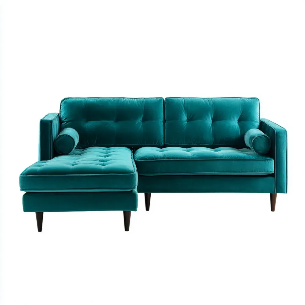 Ecksofa aus Samt in Türkis mit Zylinderkissen