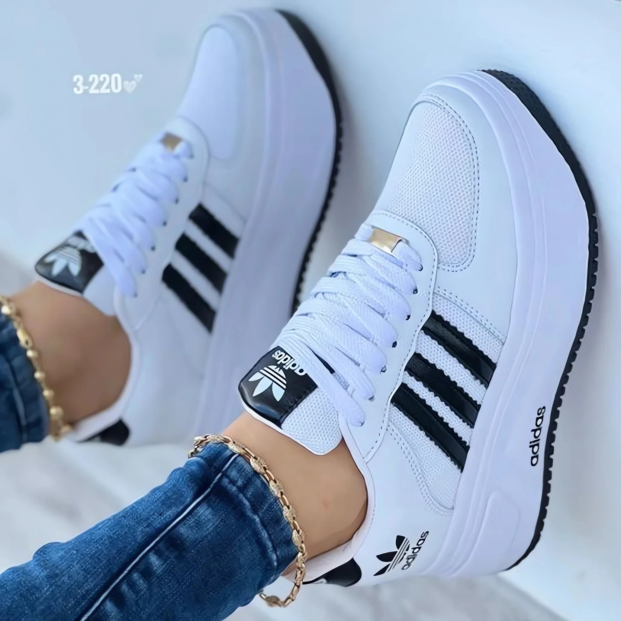 Adidas® women's leather sneakers