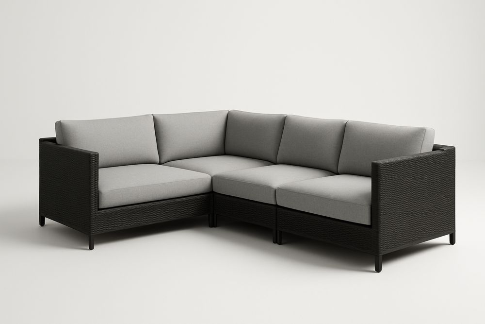 Narożnik zewnętrzny z rattanu z szarymi poduszkami