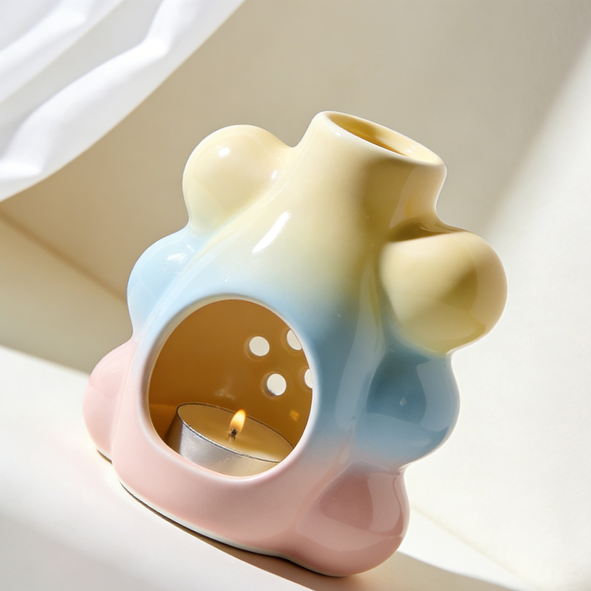 Trzy ceramiczne kominki zapachowe