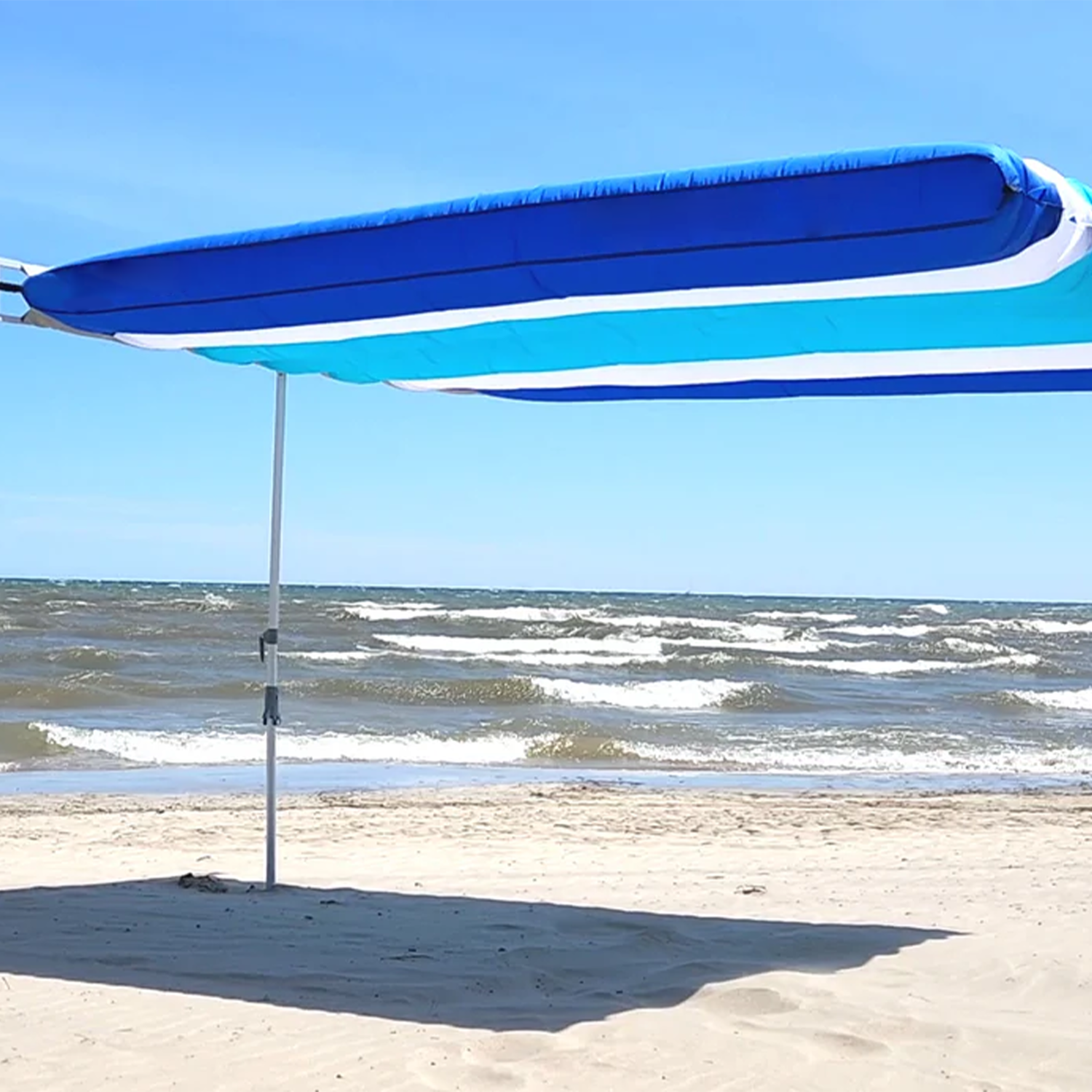 Wind-resistant, inflatable, silent beach sun canopy