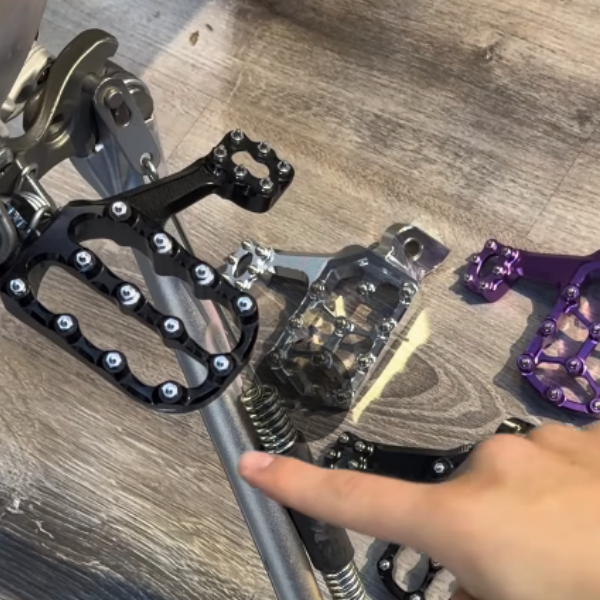 Adjustable Foot Pegs with Ankle Saver Technology