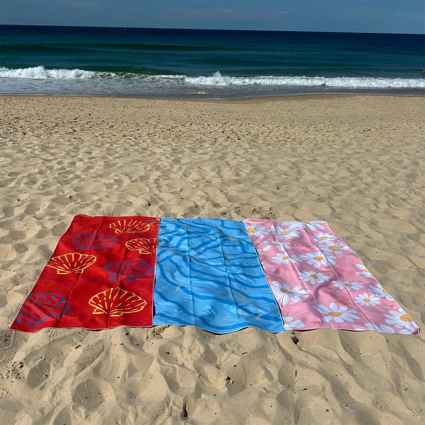 Convenient magnetic beach towel