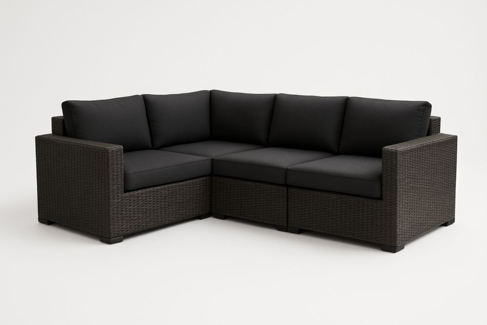 Czarny narożnik z technorattanu z poduszkami