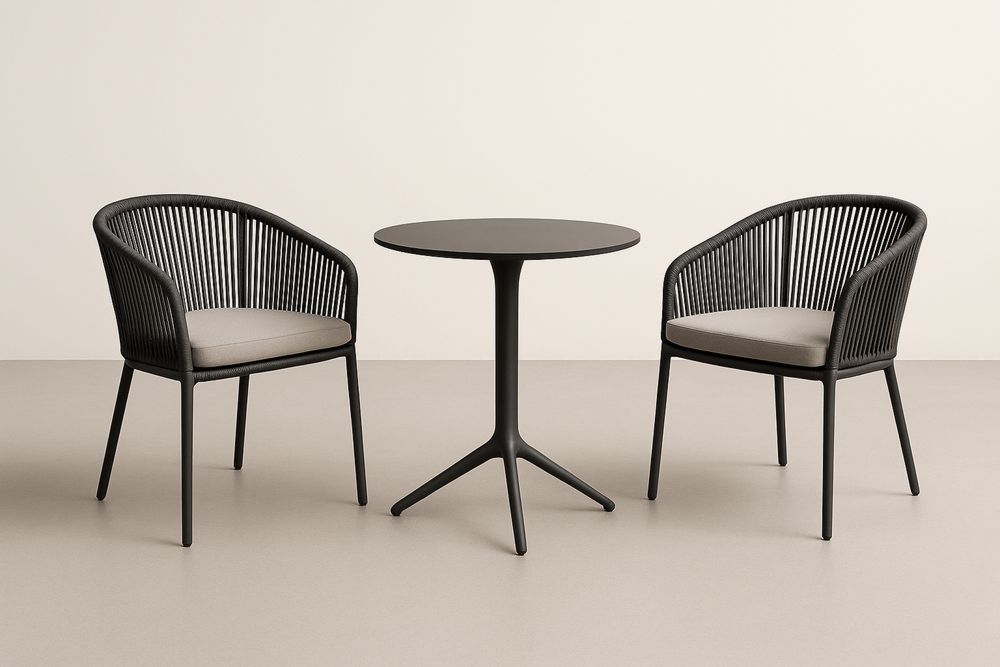 Zestaw mebli ogrodowych stolik metalowy okrągły czarny krzesła aluminiowe z poduszką szary