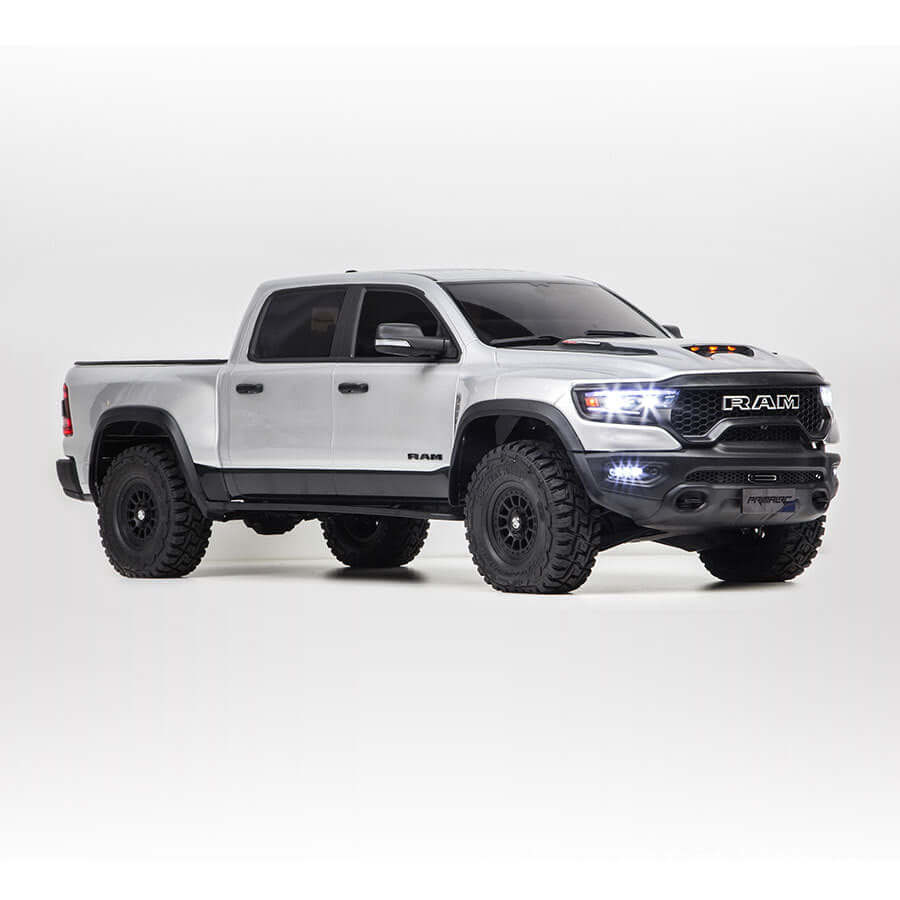 All-terrain rubber tires and alloy wheels of TRACTION HOBBY Dodge RAM crawler
