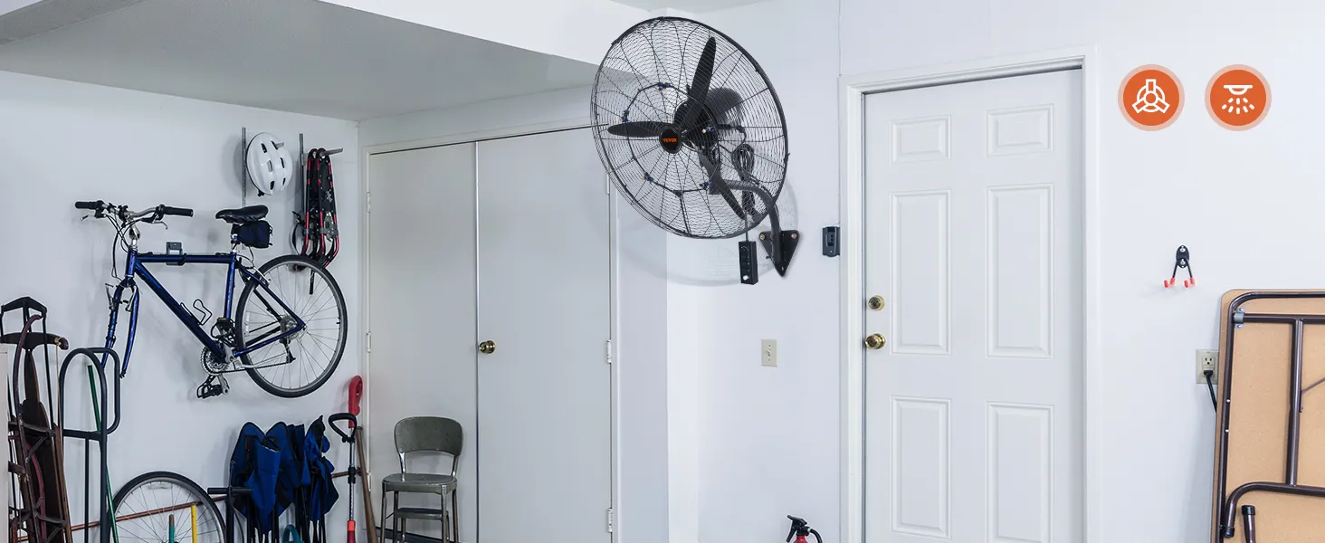 VEVOR wall-mount misting fan in a garage, with a bicycle and equipment hung on the wall.