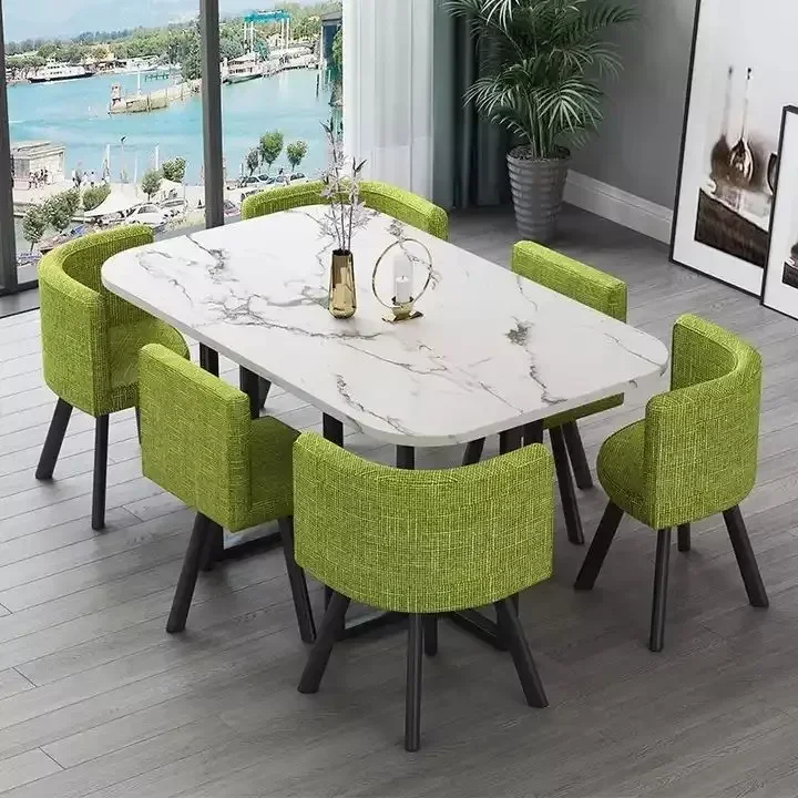 Nueva mesa de comedor clásica moderna con encimera de mármol blanco para sala de estar con juego de 6 sillas