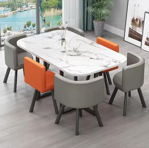 Nueva mesa de comedor clásica moderna con encimera de mármol blanco para sala de estar con juego de 6 sillas
